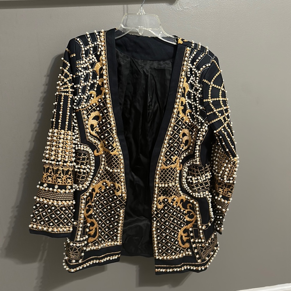 Brand new! Beautiful just didn’t fit and I waited too long to return it.